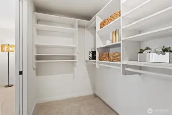 Primary bedroom with 5-piece ensuite bath and large walk-in closet