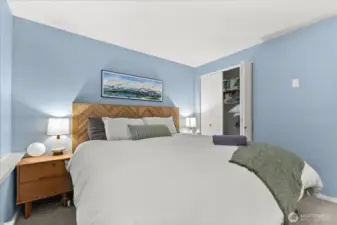 Closet provides additional storage for linens.