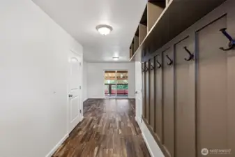 Entry way that leads to a secondary living space/ flex space and a bedroom and full bathroom