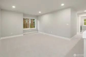 Upper level landing doubles as a bonus room