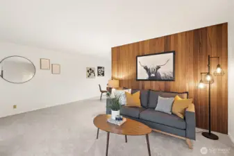 Mid-century modern living room with warm wood accents and plenty of natural light.