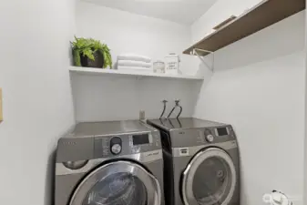 Laundry area downstairs. Washer/dryer stay!