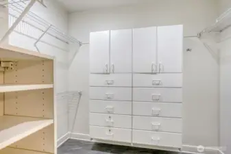 Primary walk-in closet has built-in's.
