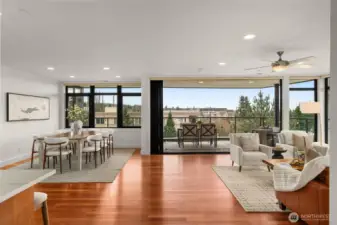 With the NanaWall open, the living room and dining room connect directly to the covered patio.