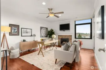 This spacious den could also work as a bedroom, and has a door to the covered patio (at right).