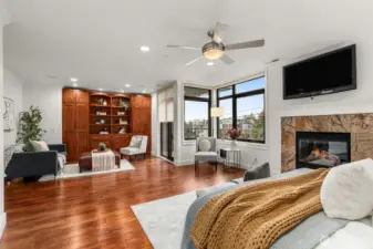 Note the built-in bookshelves and cabinetry in the primary suite.