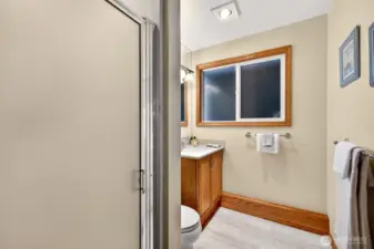 Adjacent to the 4th bedroom you will find a convenient 3/4 bath with a walk in shower, updated vanity, and a window for natural light and ventilation. Durable finishes and a straightforward layout make it an easy, low maintenance space that works well for guests and daily routines.