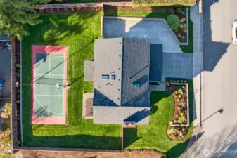 A top down view highlights how efficiently the property uses its 11,628 sf lot, with the sports court positioned for maximum usability, a generous lawn area, and strong separation between outdoor living and parking. This layout supports both active living and relaxed entertaining, with plenty of space for long term flexibility.