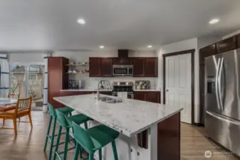 Granite counter tops in open kitchen.