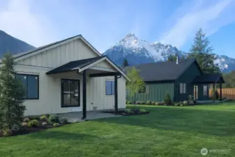 Back of home - AI representing landscaping - similar to be completed prior to closing.