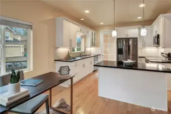 A center island is ideally located between the kitchen and the kitchen dining area.