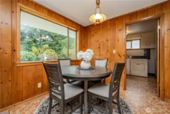 More pretty backyard views can be enjoyed from the Breakfast Nook. Love the rustic feel of the cedar walls in this space.