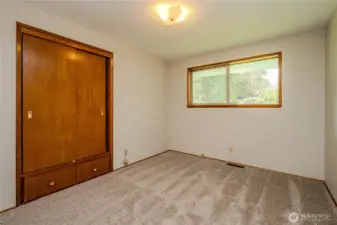 Bedroom #2 with backyard views