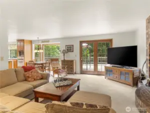 Family room with access to the spacious deck.
