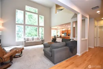 Great Room with a Wall of Windows! Adjacent to a greenbelt for a stunning and private view.