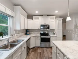 This kitchen has it all!  You'll love the holidays and having company in this home.