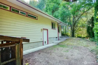 Door at side of attached garage.