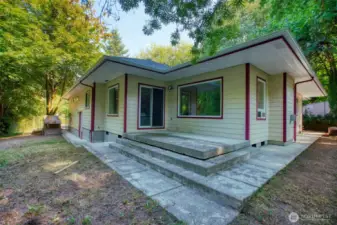 Move-in ready rambler with easy maintenance features - new roof & gutters, Hardie siding and concrete sidewalks all the way around.