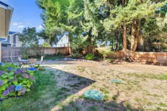 Landscaped and fully fenced backyard