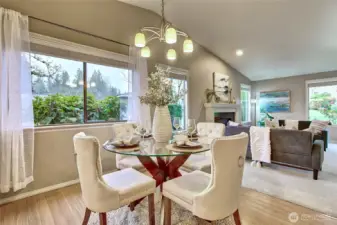 Dining area looking towards the living room. The vaulted ceiling makes this room look spacious.