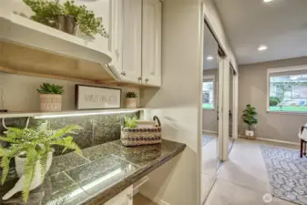 A built-in desk, at the entry to the primary bedroom, is a great workspace!