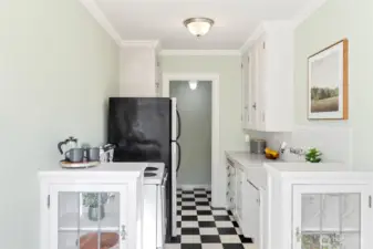 Charming features; marble counters, original hardwood floors, cool cabinetry.