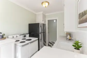 Charming features; marble counters, original hardwood floors, cool cabinetry.