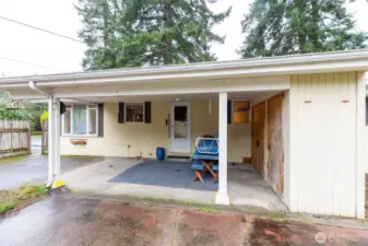 Covered back patio of main home with storage