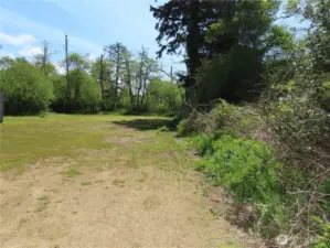 Property off to the right of the carport