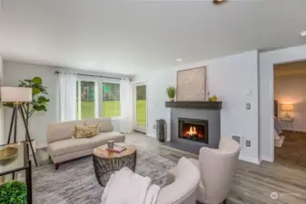 Living area with wood burning fireplace