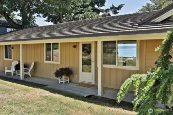 Covered front porch extends the north side of your home and provides a nice place to find shade on hot sunny days. Let's go inside....
