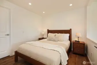 A cozy spot for your bed and also a great spot for a home office. Door to the left edge of this photo goes to a shop space that has a door to the outside/front of the house.