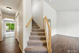 Front Entry Hallway With Half Bath & Coat Closet