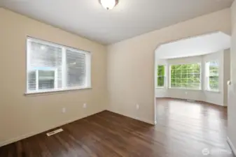 Formal Dining Connects Living Room & Kitchen