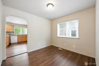 Formal Dining Connects Living Room & Kitchen