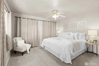 Bedroom 1 is generous in size and features dual closets.  Charming view overlooking your front yard and the Sycamore tree