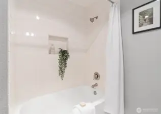 Full bathroom located on the lower level.
