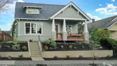 Brand new custom Craftsman home with primary bed on main in the coveted Proctor District. New construction designed for low maintenance landscaping & energy efficiency.