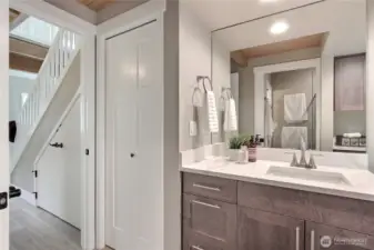 Primary bath features a separate guest entry and separate dual sinks.