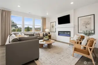 Cozy up in your great room.   Pictures are for representational purposes only, colors and features may vary.