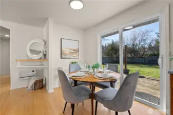Dining area opens to outdoor living and your fully fenced back yard.