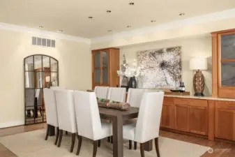 The formal dining room will sit 8-10 comfortable. The stunning wood cabinets allow for ease with entertaining.