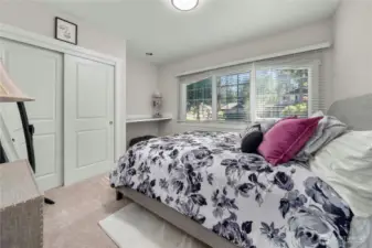 One of two large main-floor bedrooms, everything in the house is perfect and new.