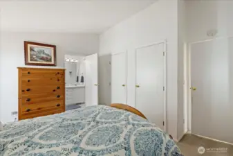 Primary bedroom has two closets, lots of storage.