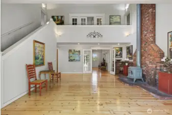 Vaulted living room with refinished southern pine floors