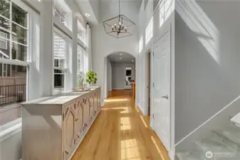 Entry hallway from front door to stairs and kitchen