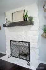 Solid fuel burning fireplace in dining room area