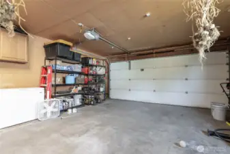 2 car garage with extra storage room