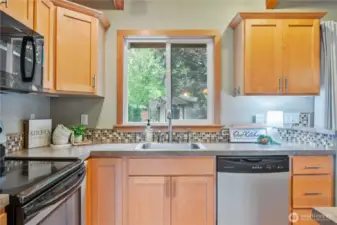 Kitchen window looking out to your private back yard