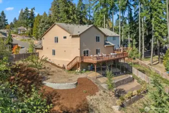 Freshly landscaped with new terraces—more usable space to enjoy!